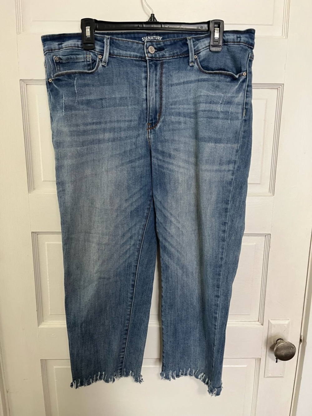 Signature Levi’s Medium Blue Raw Hem Straight Jeans